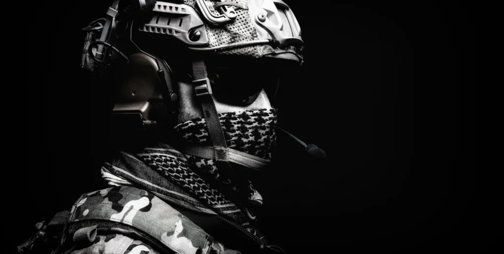 Black and white close up of an airsoft player